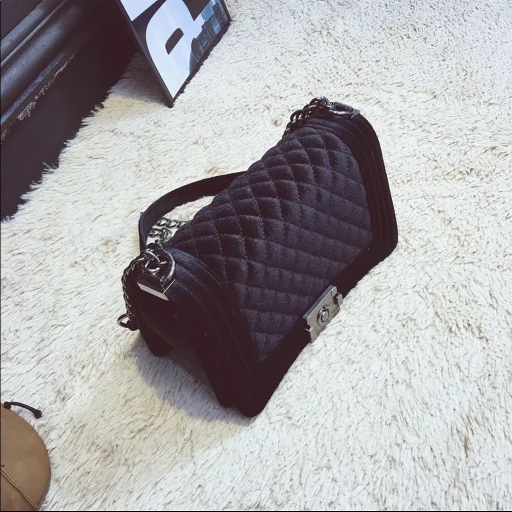 Black velvet handbag